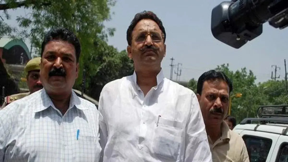 Mukhtar Ansari surrounded by reporters, sparking speculation with his alleged demise.